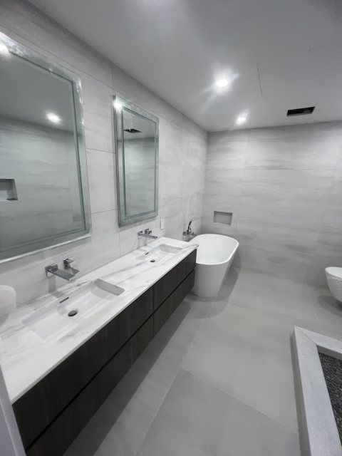 Bathrooms remodel by A&A Construction